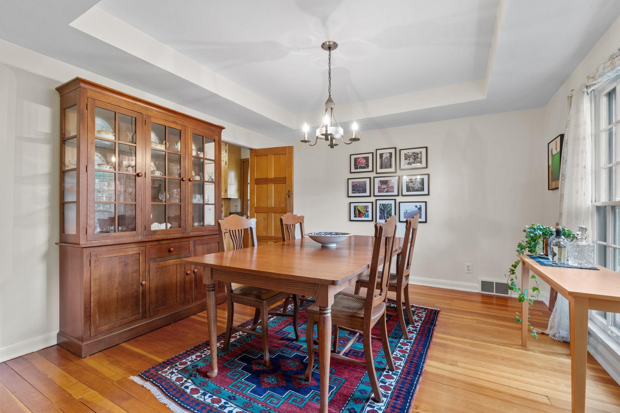 Adjacent to the living room is a very large dining room