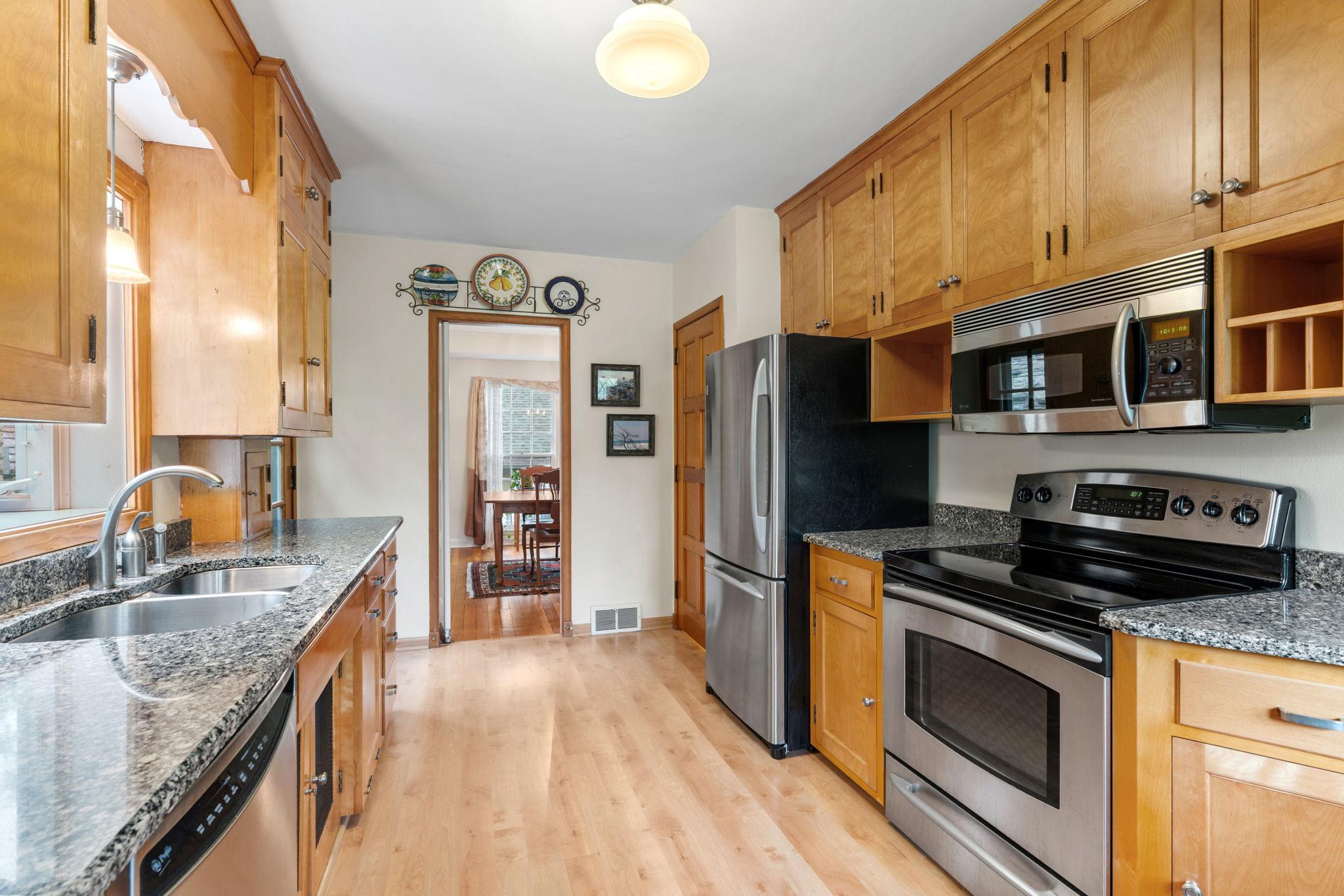 The swinging door between kitchen and dining area is a favorite feature. Charming and functional.