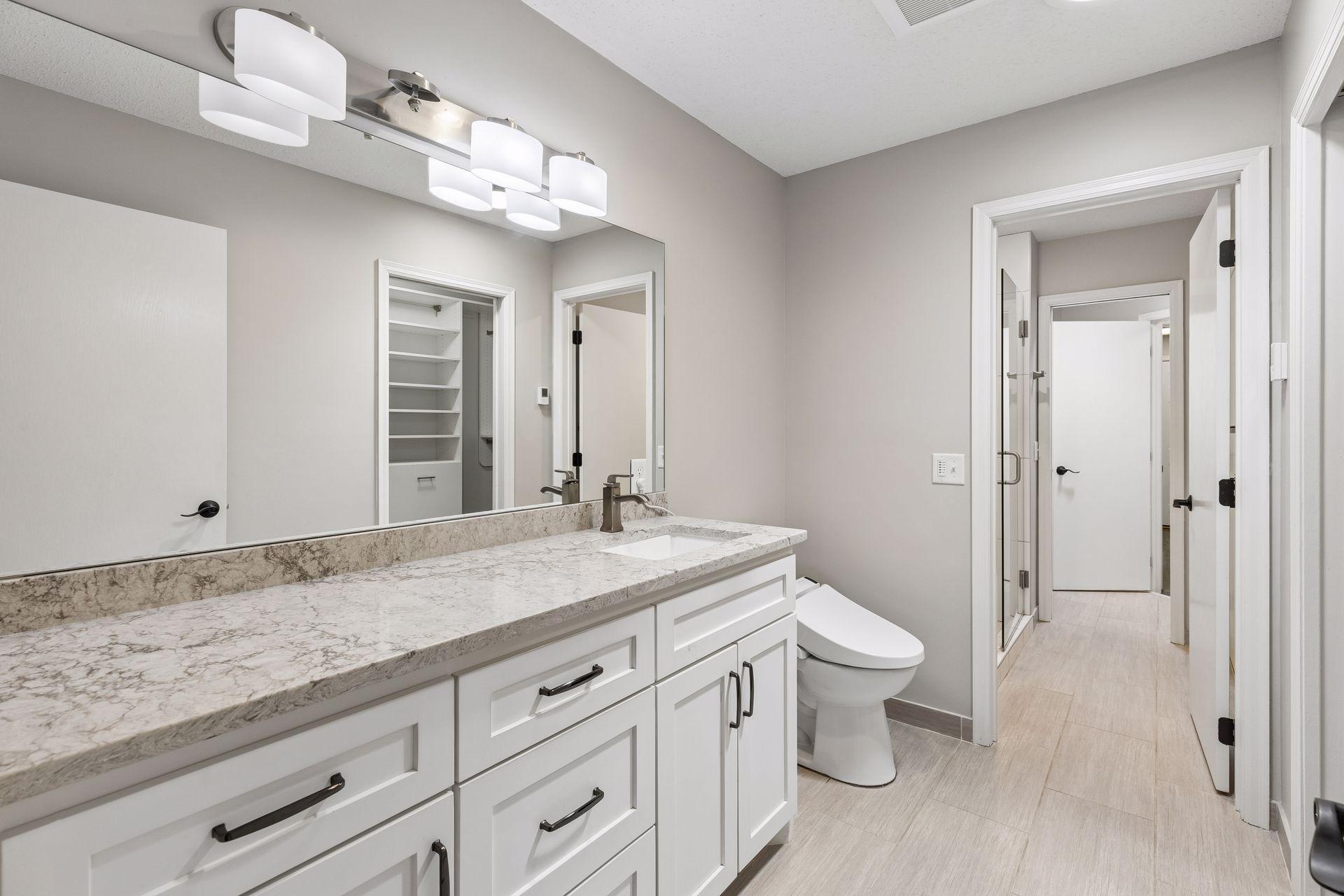 Primary full bathroom with heated floors.