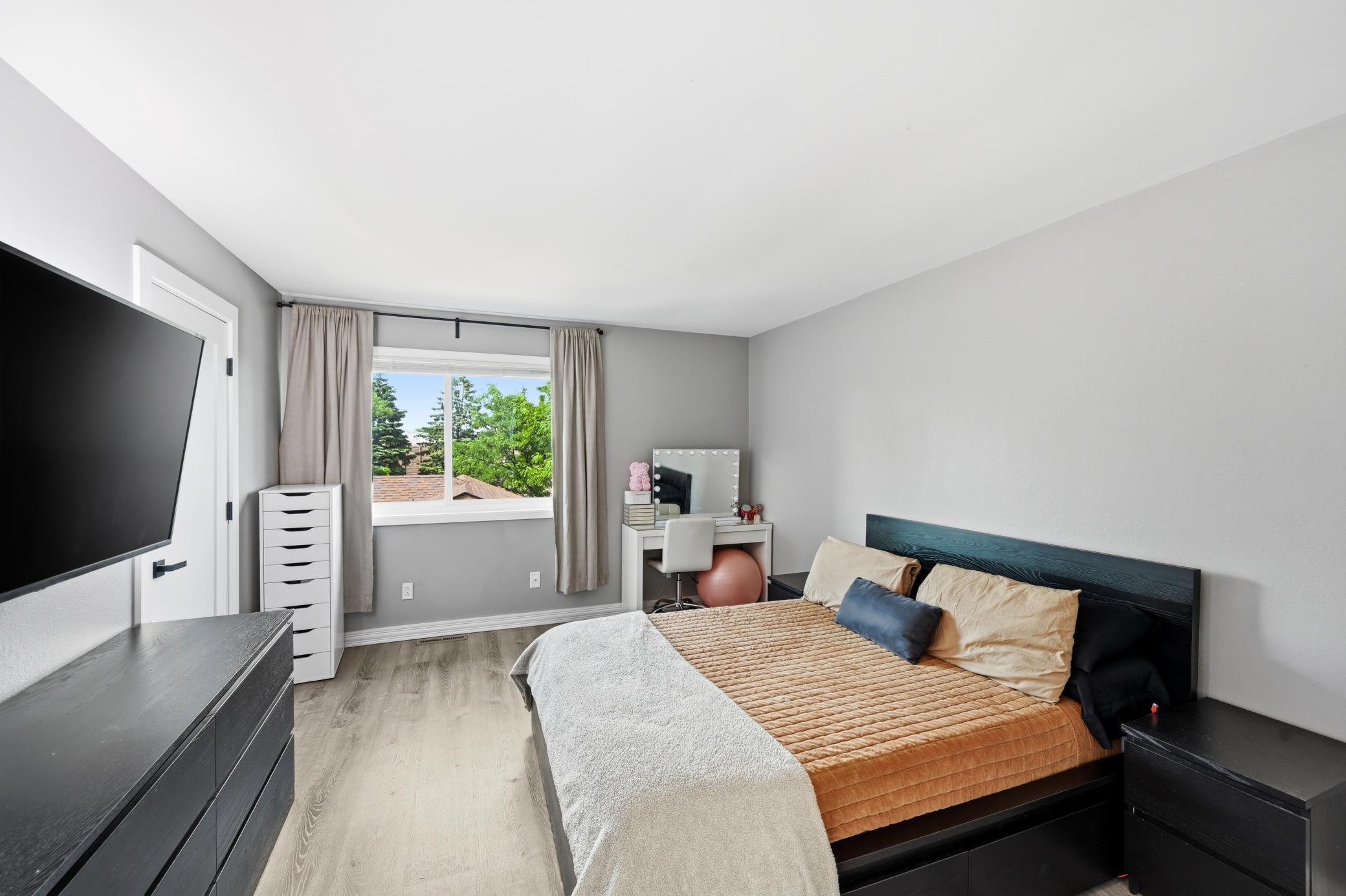 Primary bedroom with walk-in closet.