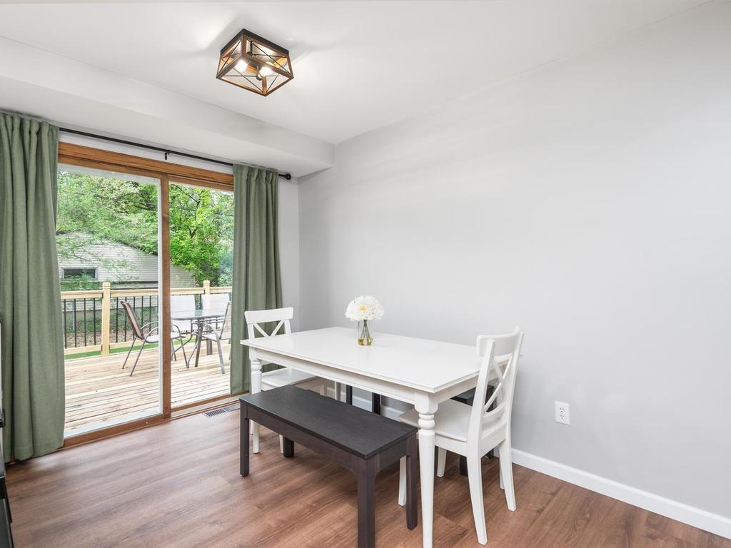 Easy access to deck and backyard through patio door.