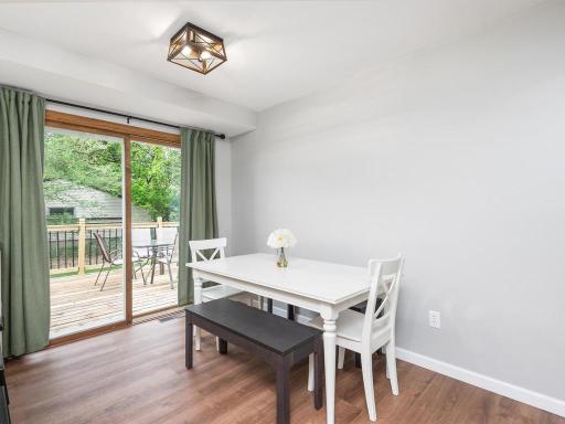 Easy access to deck and backyard through patio door.