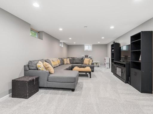 Family Room - LL features new carpet and updated recessed lighting in 2024.