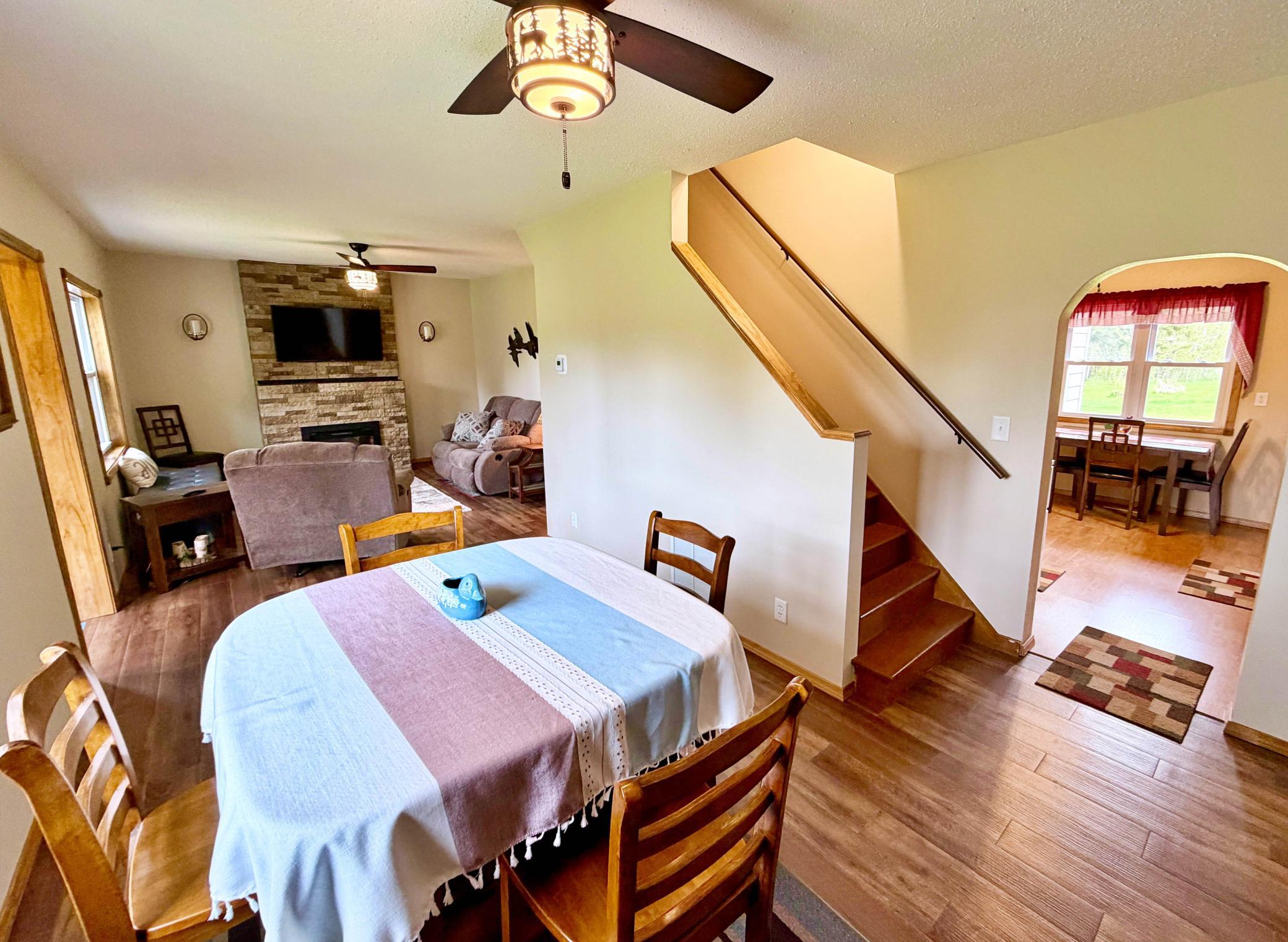 Dining area view to living room kitchen and upstairs.jpg