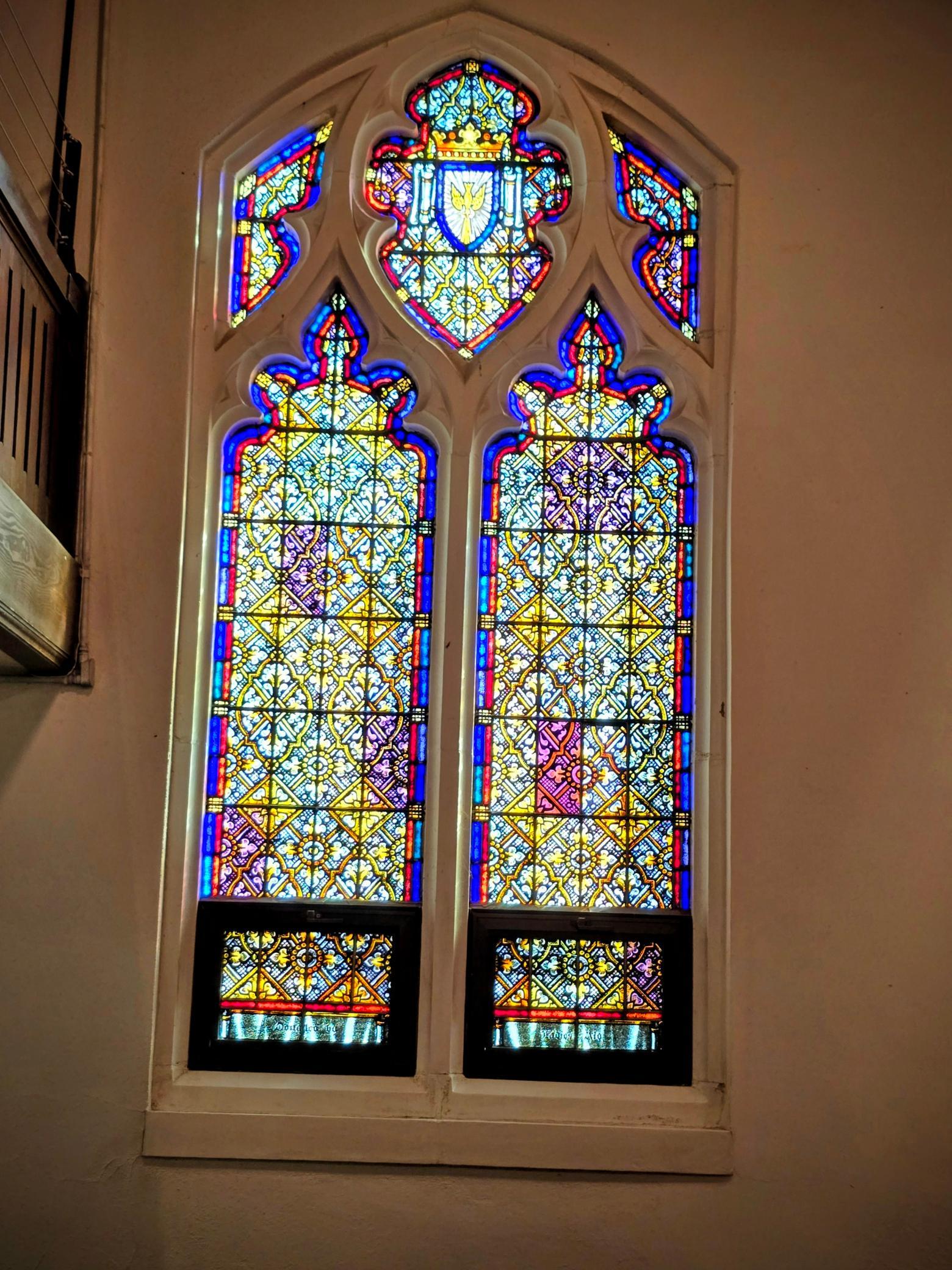 “Beautiful side stained-glass windows fill the sanctuary with timeless architectural character.”