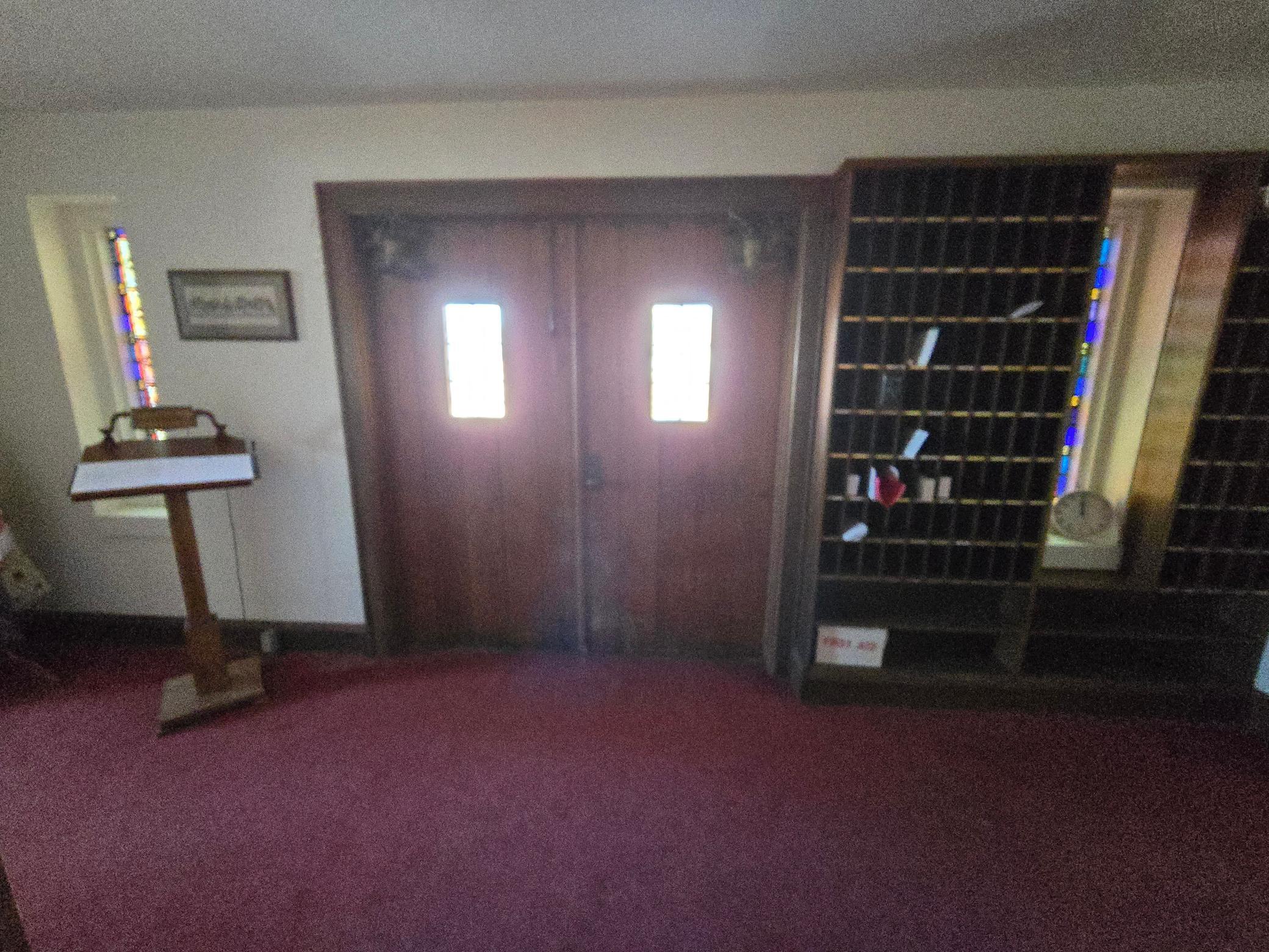 Inside the front sanctuary doors.