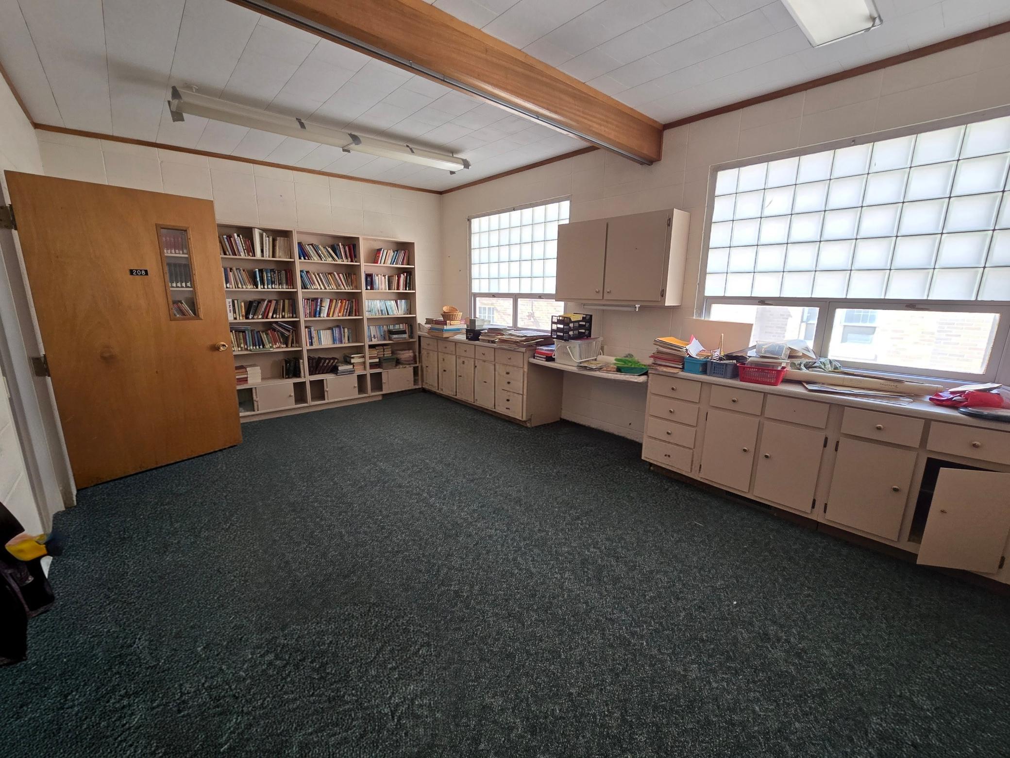 Library area with shelving and cabinets