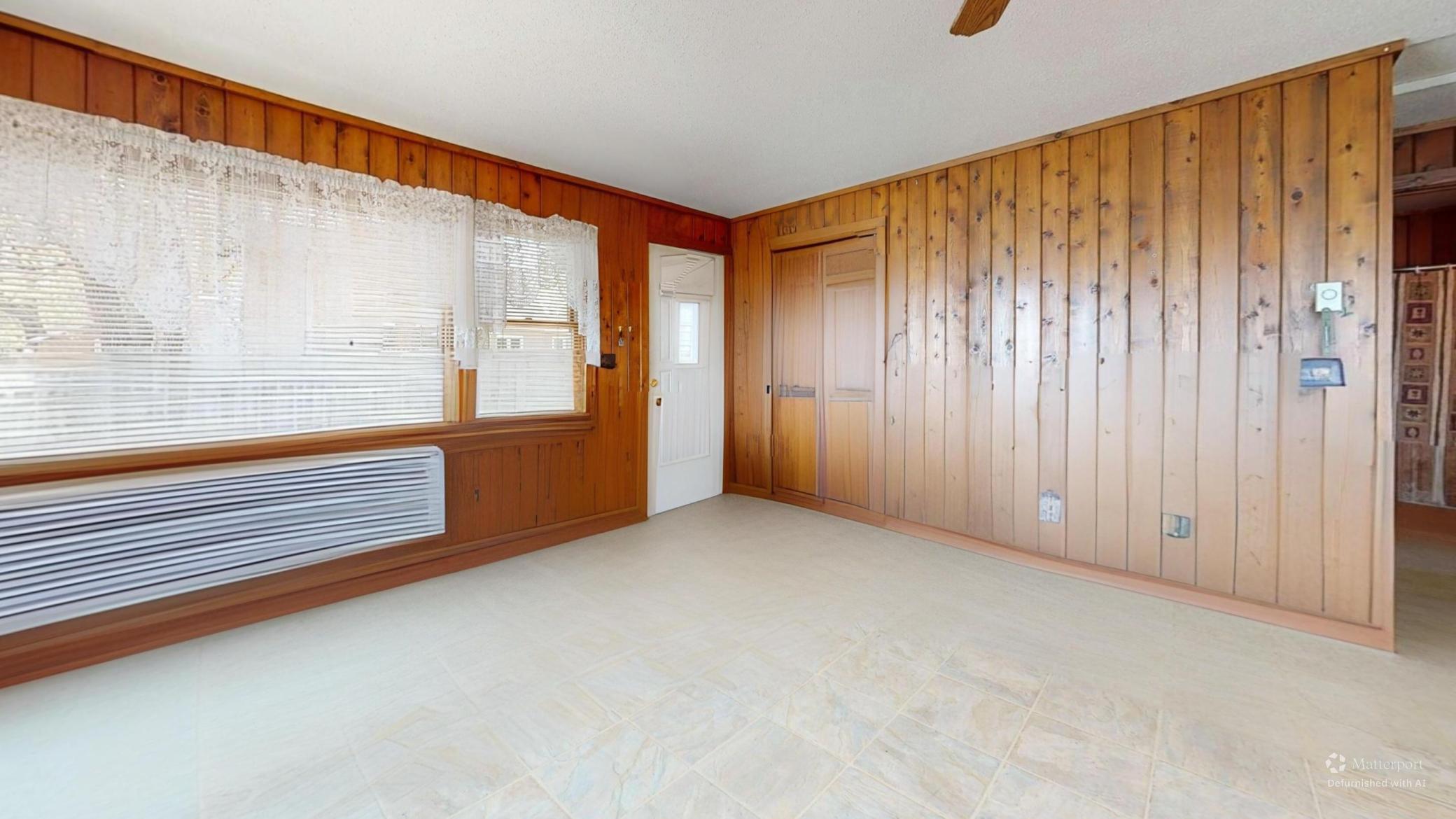 1245-West-Lake-Dr-Living-Room-Defurnished 1.jpg
