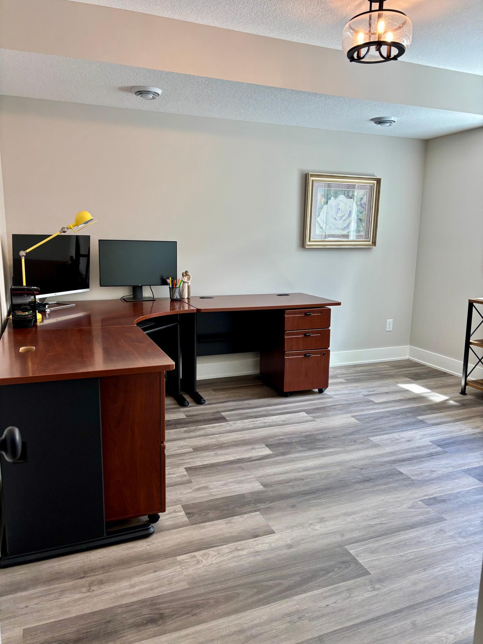 Lower level bedroom or office! Detailed with oversized egress window allowing for even more sunshine!!