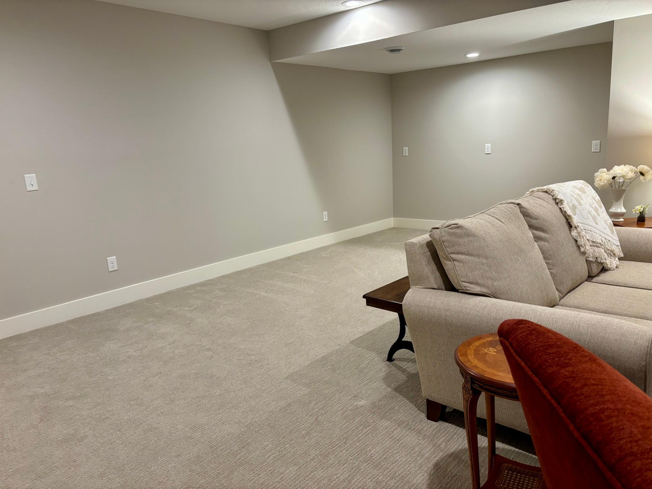 Lower level has versatile bonus alcove that offers the perfect opportunity for a dry bar, game nights or reading retreat!!