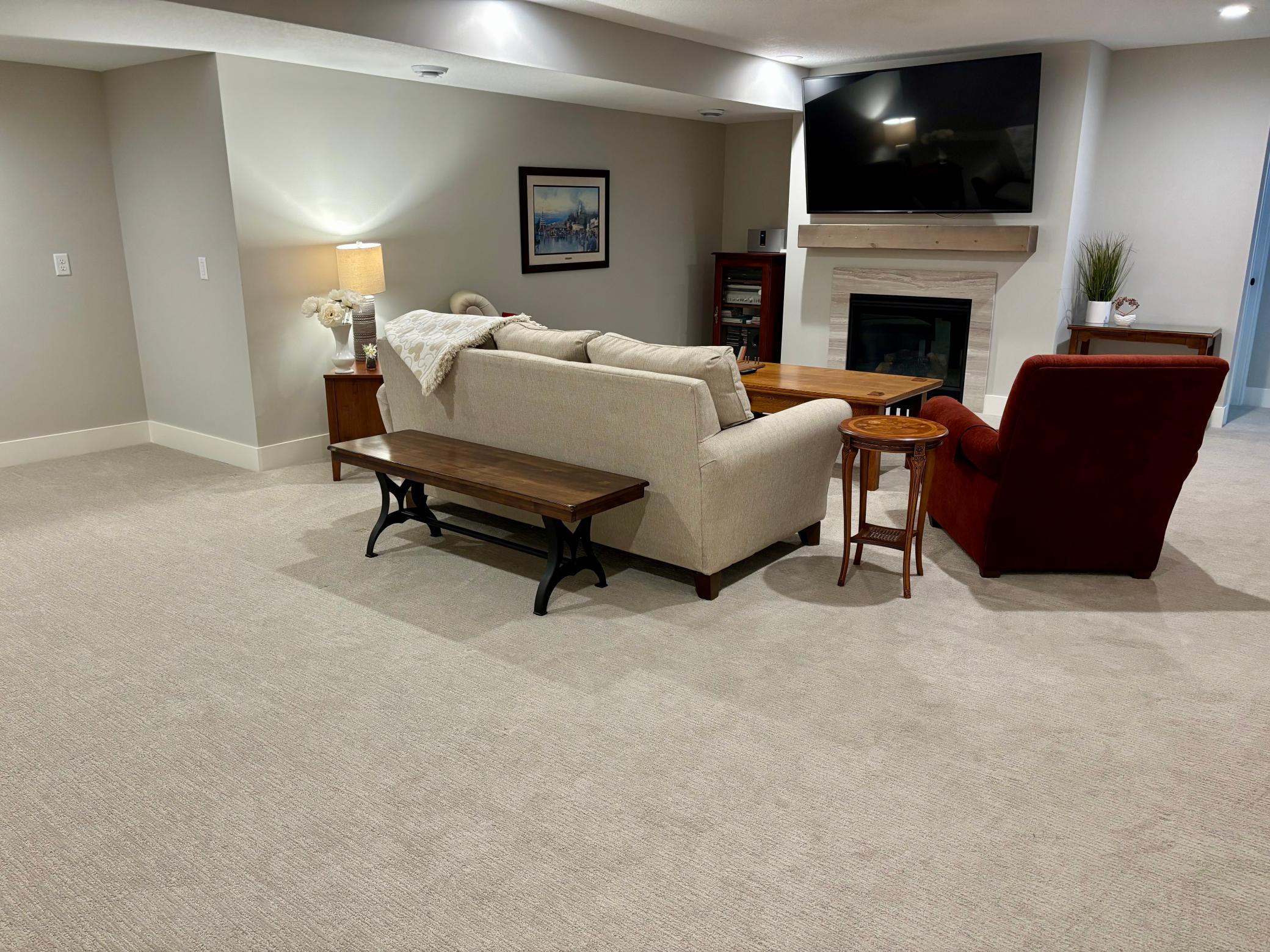 Lower level has a versatile bonus alcove that offers the perfect opportunity for a dry bar, game nights or reading retreat!