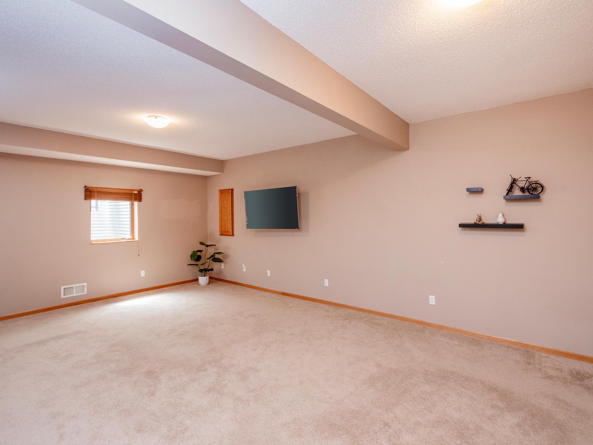 Large lower level amusement room.