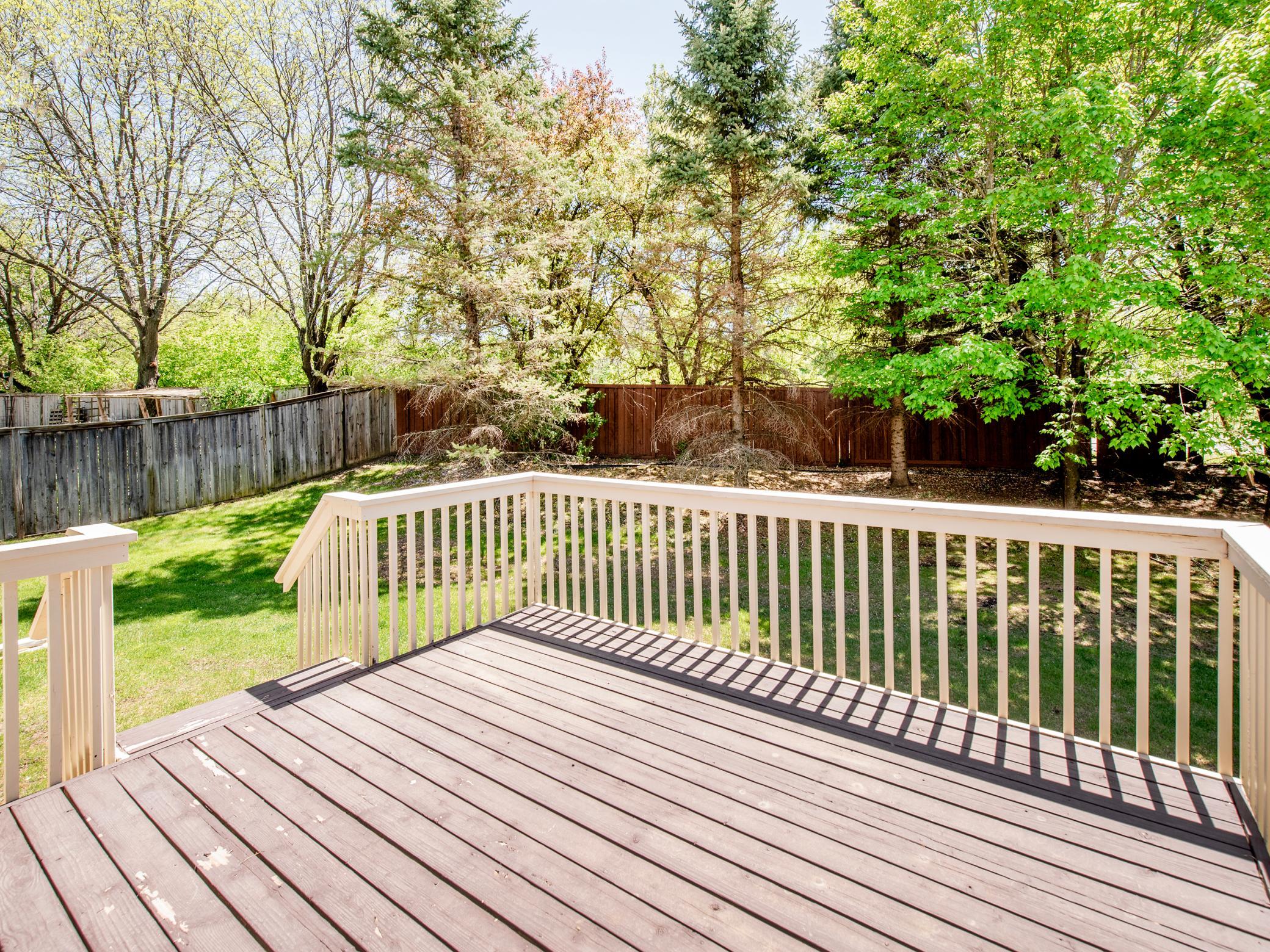 Generous outdoor deck perfect for gatherings and quiet relaxation.