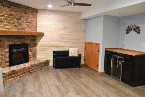 Family Room w Fire place - Lower Level.JPG