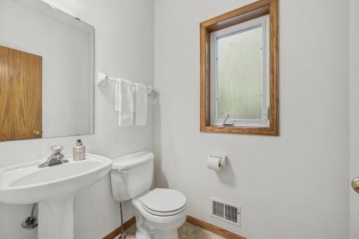 Convenient powder bath located on the main level for guests and everyday use
