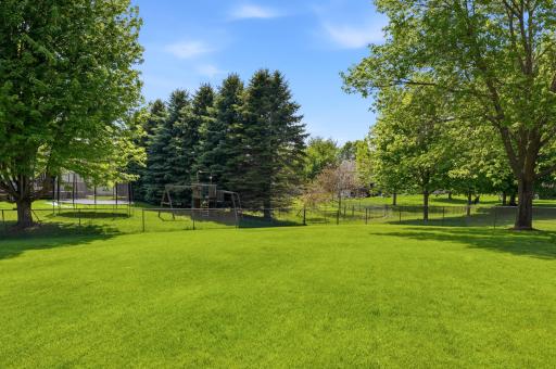 In-ground sprinkler system helps keep the yard lush and green all season long!