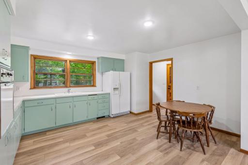 Easy access to attached garage and there is a broom closet to the left and door to backyard