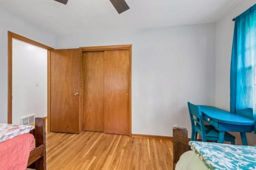 Enough space for two beds and a desk - original hardwood floors