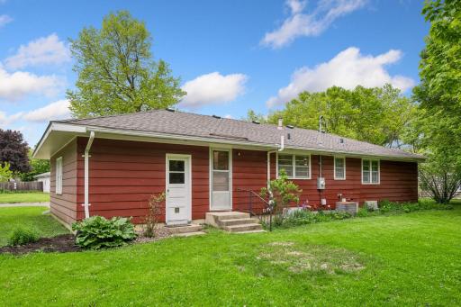 Easy access to backyard from garage and back hall in kitchen