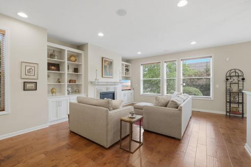 The main-level living room offers a comfortable place to unwind, while the unfinished lower level awaits your finishing touches and offers room to create additional space tailored to your needs.