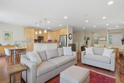 Warm and inviting living room. Hardwood floors flow seamlessly through the main living spaces, adding warmth and continuity to the living room.