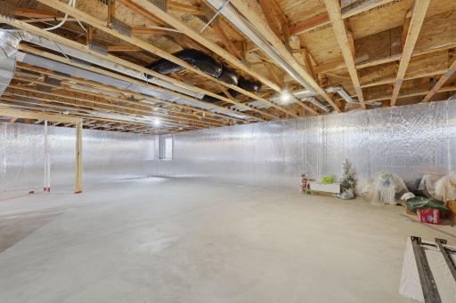 The large unfinished lower level gives you plenty of room for storage, a workshop, hobbies or all those extras you want tucked away while keeping the main level neat and uncluttered.