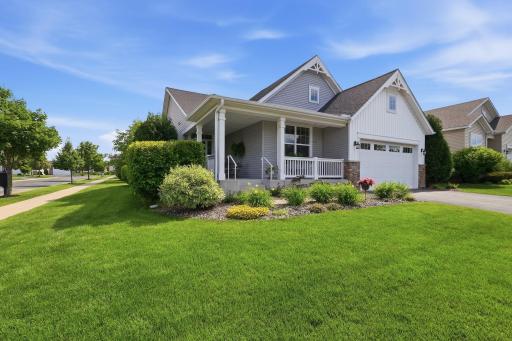 A spacious corner lot paired with the large green space across the street provides a wonderful sense of openness, privacy and curb appeal.