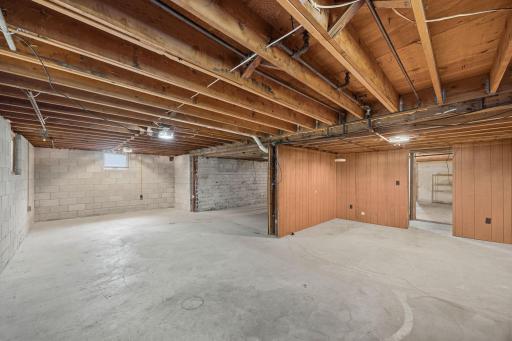 Full basement with stair case in the front of house and in back of house