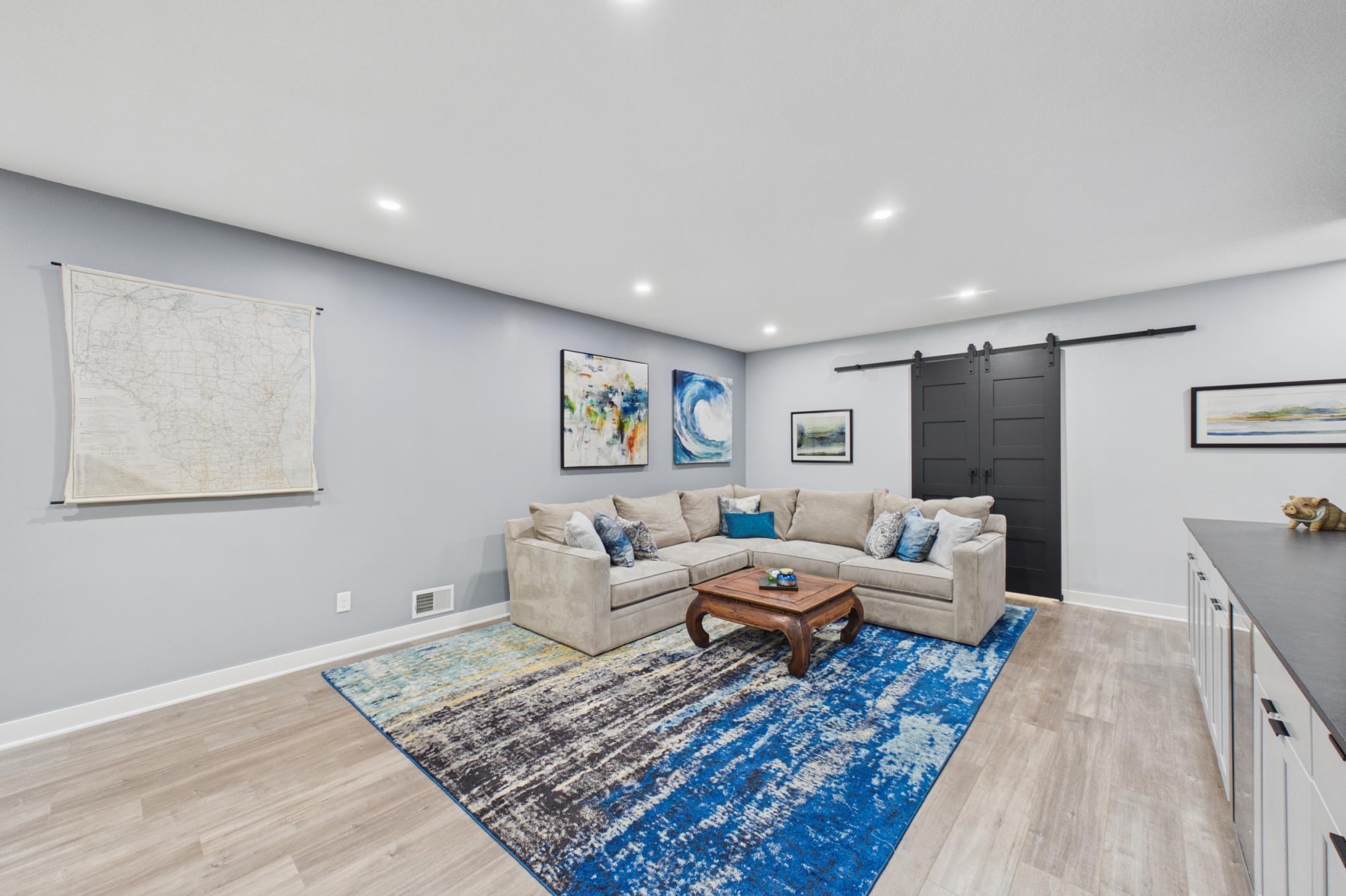 Sliding doors lead to a large storage room