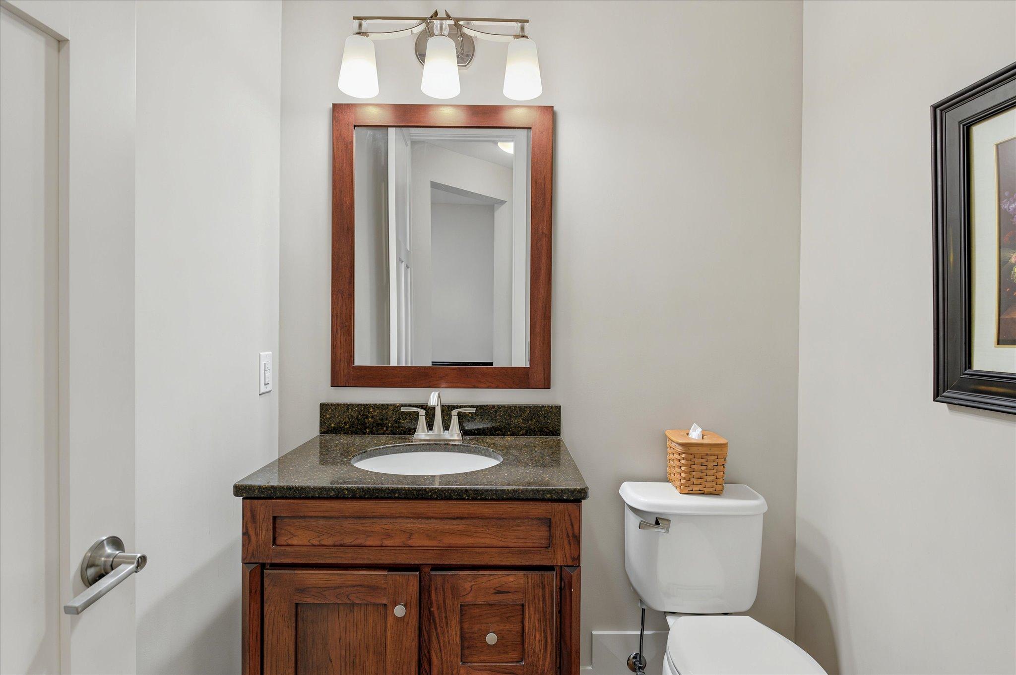 Main floor powder room off the front entry