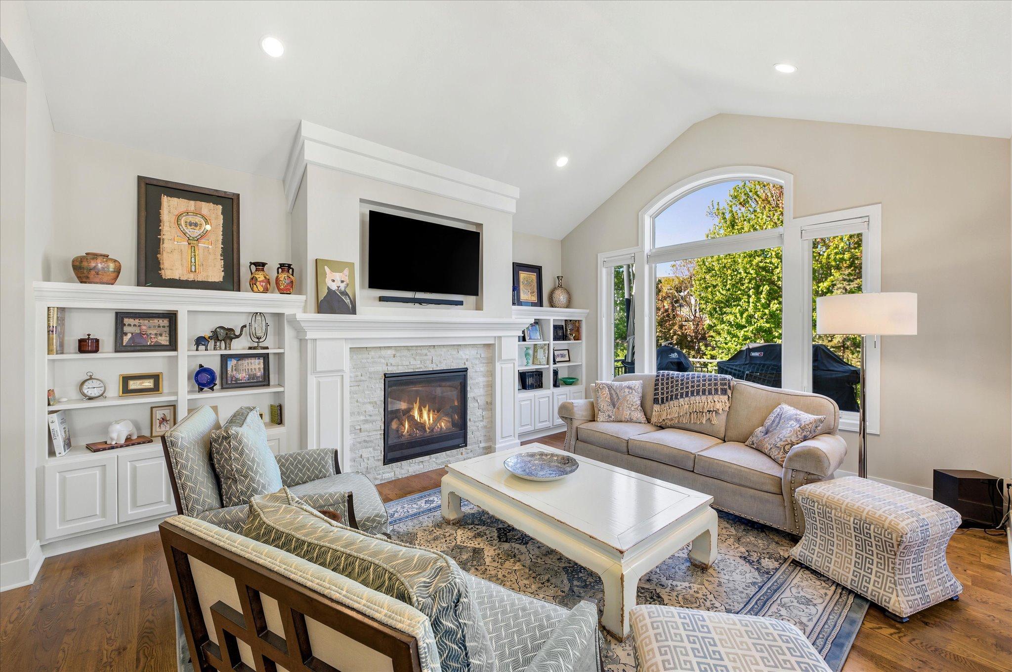 Wall of windows in the living room brings in an abundance of light