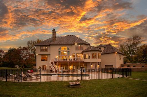 The homeâs rear exterior, captured in all its beauty.