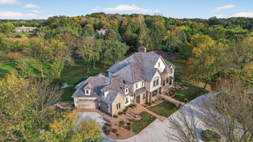 Highlighting the front of the home from above.