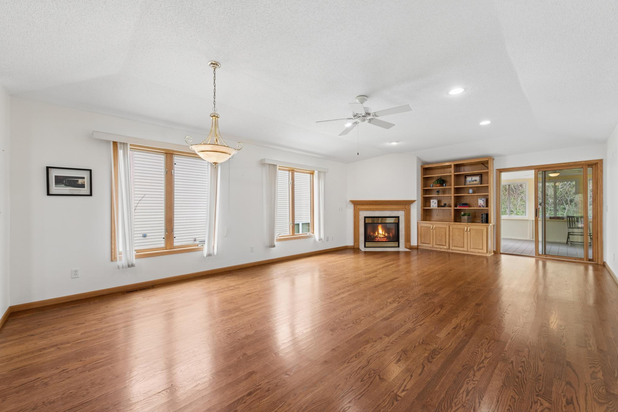 Beautiful Great Room with wood floors, fireplace and built ins.