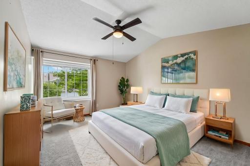 Enjoy a comfortable and relaxing retreat in your spacious primary bedroom.