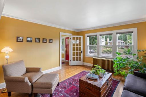 Sunlit living room with eastern and southern light