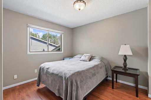 Comfortable secondary bedroom offering a versatile space for guests, family, or a home office.