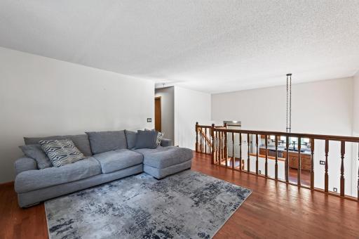 Spacious living area featuring an inviting atmosphere and plenty of room to gather with family and friends.