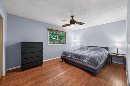 Peaceful primary bedroom offering a comfortable retreat with plenty of space to relax and unwind.
