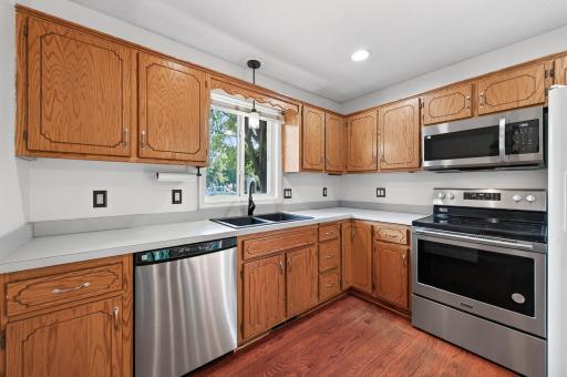 Well-equipped kitchen featuring generous cabinetry and counter space to keep everything organized and within reach.