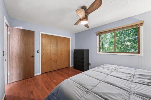 Inviting primary with a spacious layout and a warm, relaxing atmosphere.
