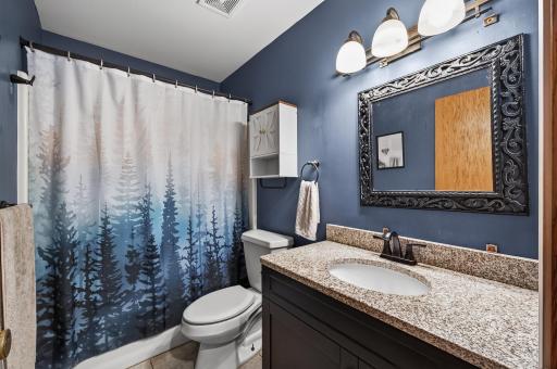 Clean and inviting full bathroom featuring a functional layout and comfortable, refreshed feel.