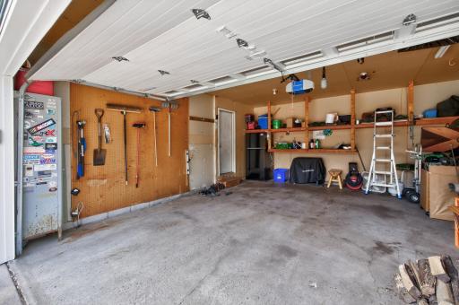 Large 2-car garage offering ample room for vehicles, storage, and additional workspace.