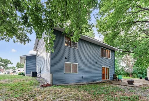 Low-maintenance vinyl siding gives the home a clean, classic exterior that is built for everyday living.