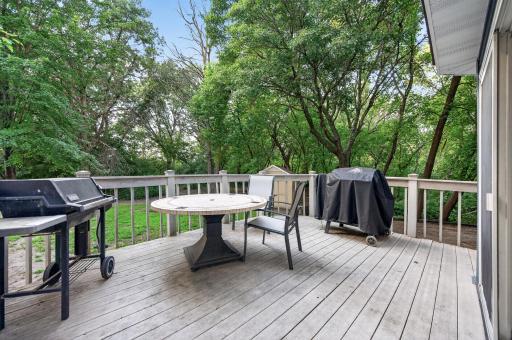 The deck extends from the dining room, creating an easy connection between indoor dining and outdoor living.