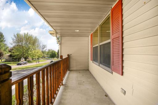 Great front porch along with maintenance free siding
