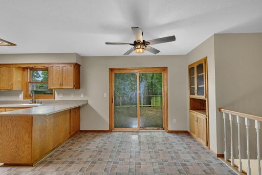 Dining area walks out to the 20x20 deck overlooking the backyard