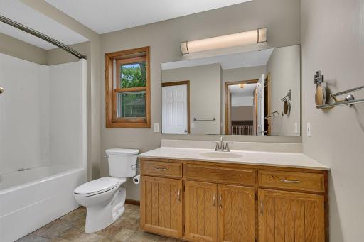 The full bath features a relaxing whirlpool tub.
