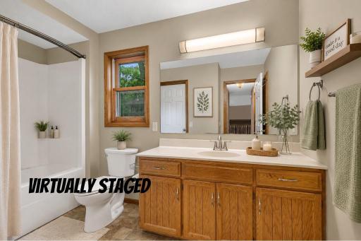 The full bath features a relaxing whirlpool tub