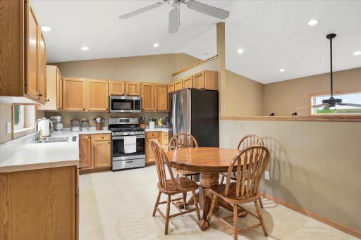 Spacious kitchen with lots of counter space, cabinetry and stainless steel appliances.